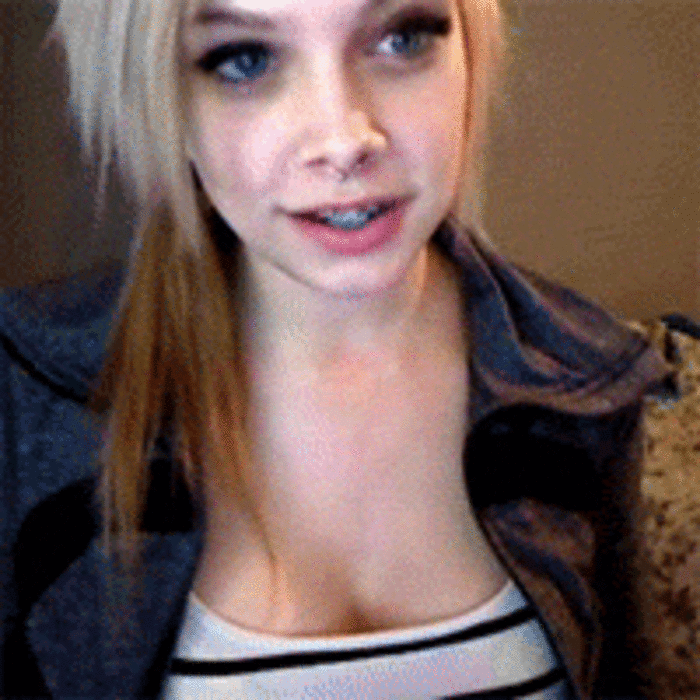 Teen girl playing with their breast gif