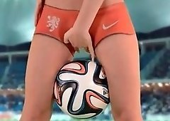 Men nude sitting a soccer ball