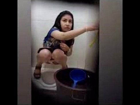 Women peeing toilet